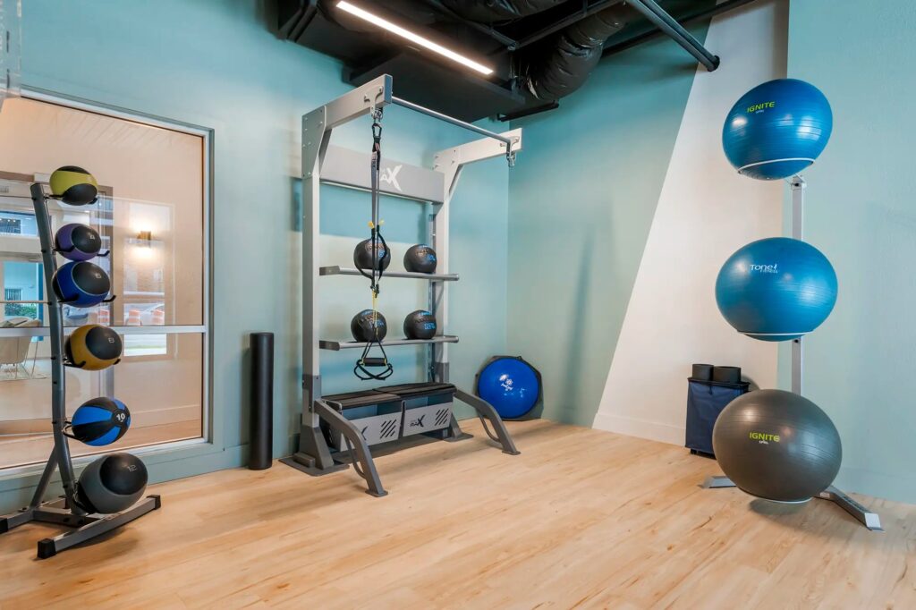 fitness center with strength training equipment